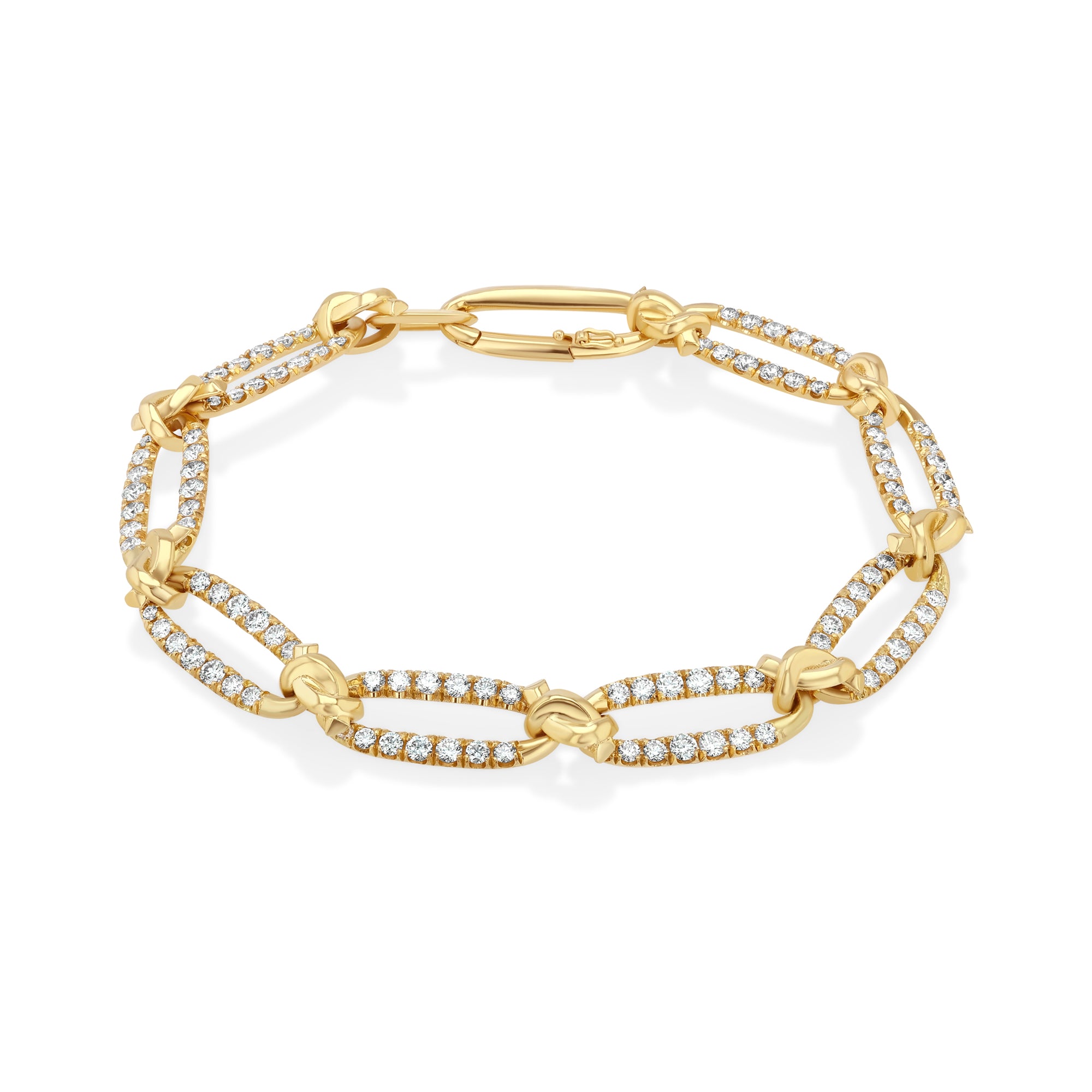Gold bracelet with diamond accents on a white background