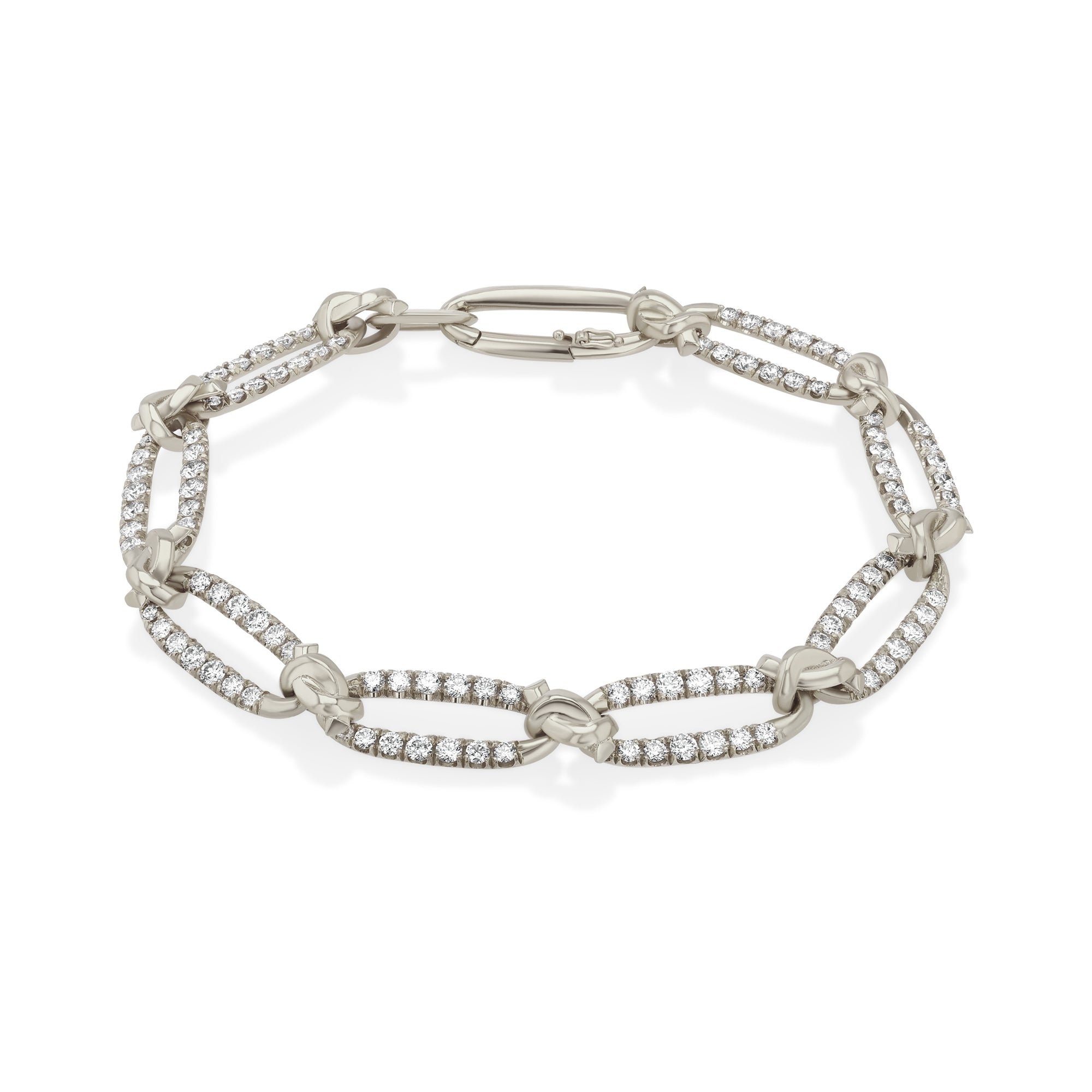 Silver bracelet with clear gemstones on a white background