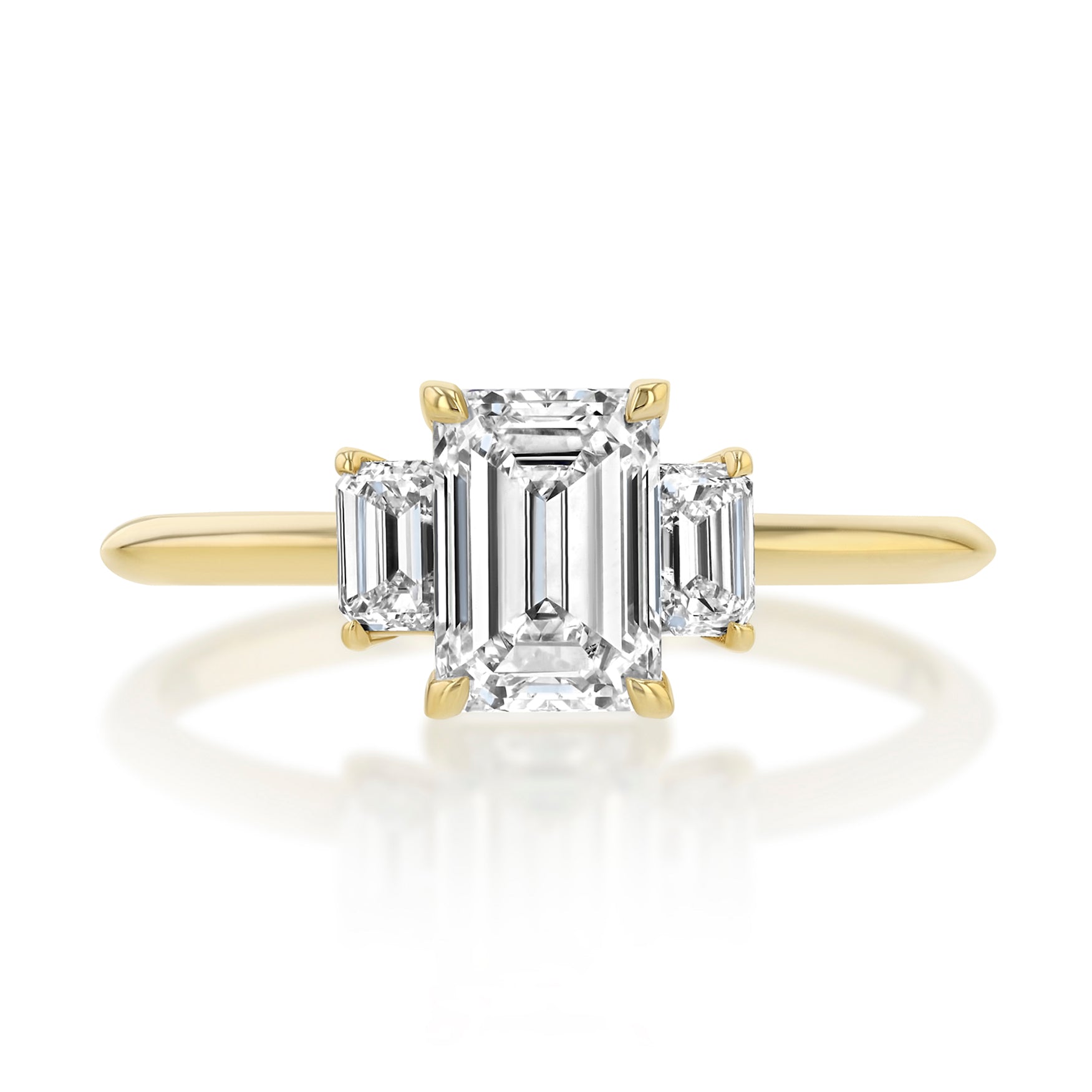 Three Stone Setting with Emerald Cut Center with Signature Knife Edge Band