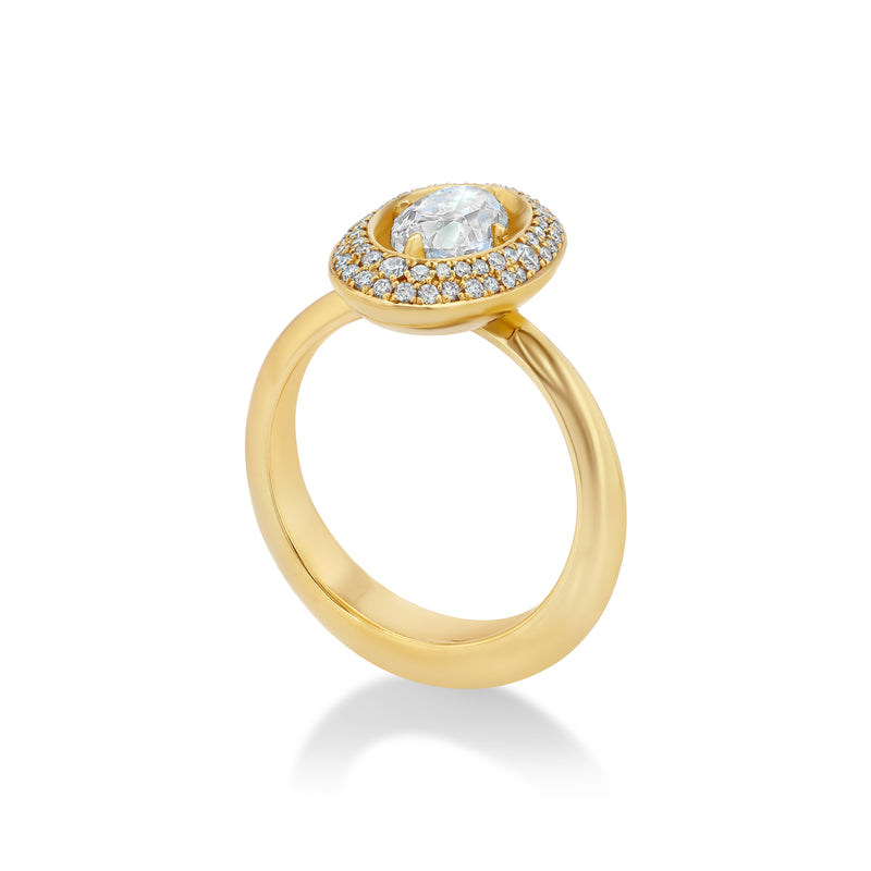 A yellow gold oval halo ring featuring a central marquise-cut diamond surrounded by a double halo of small round diamonds, set on a polished band against a white background.