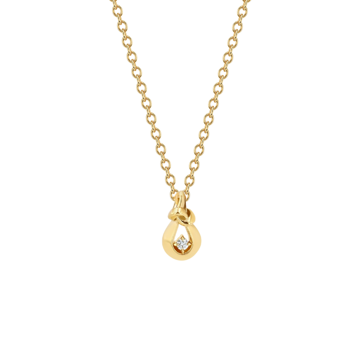 gold knot necklace with diamond on white background